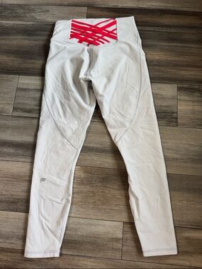 Fabletics Powerhold Slate White Leggings with Pink Lattice Back Waist